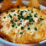 Cheesy Crab Rangoon Dip served hot with crispy wonton chips