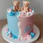 Beautiful Gender Reveal Cake with pink and blue decorations and hidden color filling